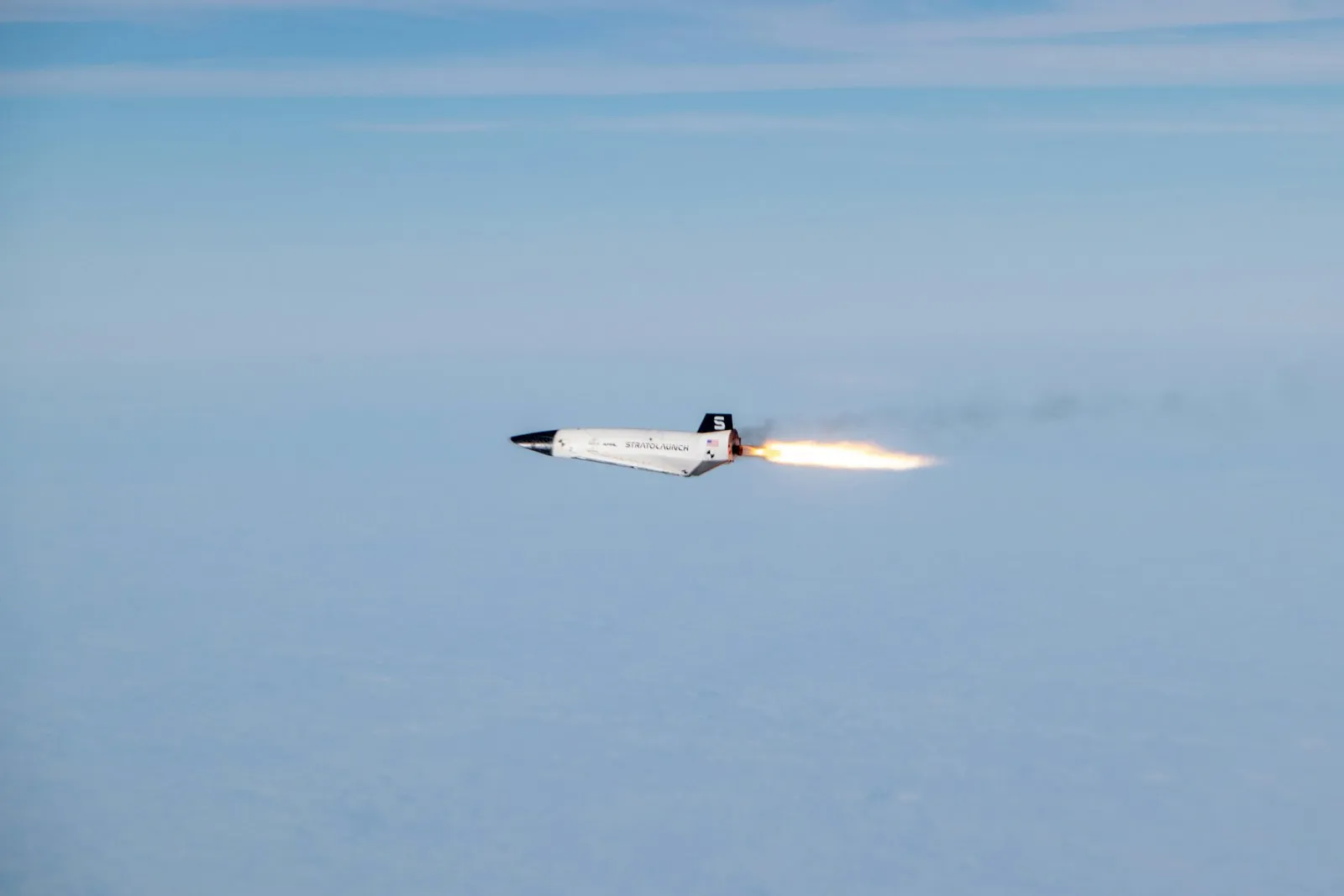 Talon-A in powered flight above the clouds